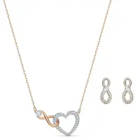 Swarovski Korusarja 'Hyperbola' kulta / hopea / läpinäkyvä