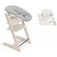Stokke Tripp Trapp syöttötuoli etukaarella ja Newborn Set -istuimella Whitewash