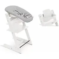 Stokke Tripp Trapp syöttötuoli etukaarella ja Newborn Set -istuimella White
