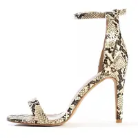 Celena Sandaalit 'CLELIA' beige / musta