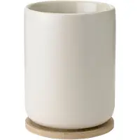 Stelton Theo Termosmuki alustalla 0,25 litraa, sand