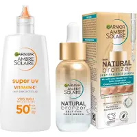 Garnier Ambre Solaire Super UV Vitamin C kevyt suojafluidi tummien läiskien ehkäisyyn SPF 50+ 40 ml