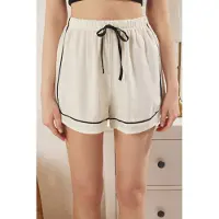Trendyol Pyjamahousut ecru / musta